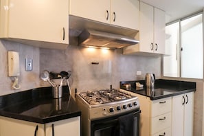 Fridge, microwave, oven, stovetop - w* | Larcomar Oceanview 2BR in Miraflores (Miraflores)