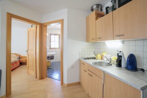Fridge, stovetop, coffee/tea maker, toaster