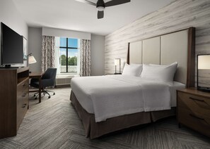 Camas con pillow-top, escritorio y espacio para trabajar con laptop 