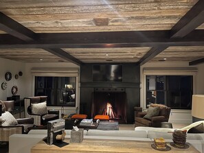 Smart TV, fireplace, DVD player, books