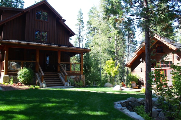 The main house & guest house sit adjacent, on level yard. Decks, patios, firepit