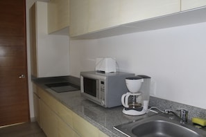 Fridge, microwave, coffee/tea maker, blender