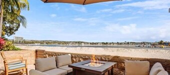 BAY FRONT - BAY LEVEL - PRIVATE PATIO - 2 CAR GARAGE- ON THE SAND