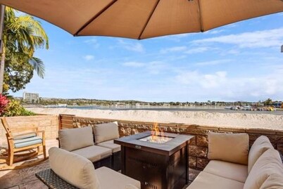 BAY FRONT - BAY LEVEL - PRIVATE PATIO - 2 CAR GARAGE- ON THE SAND