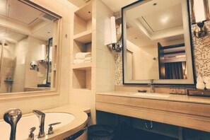 A modern bathroom with a large mirror, a sink, and a vanity with shelves. - Jin Jiang Hotel Fangchenggang (Fangchenggang)