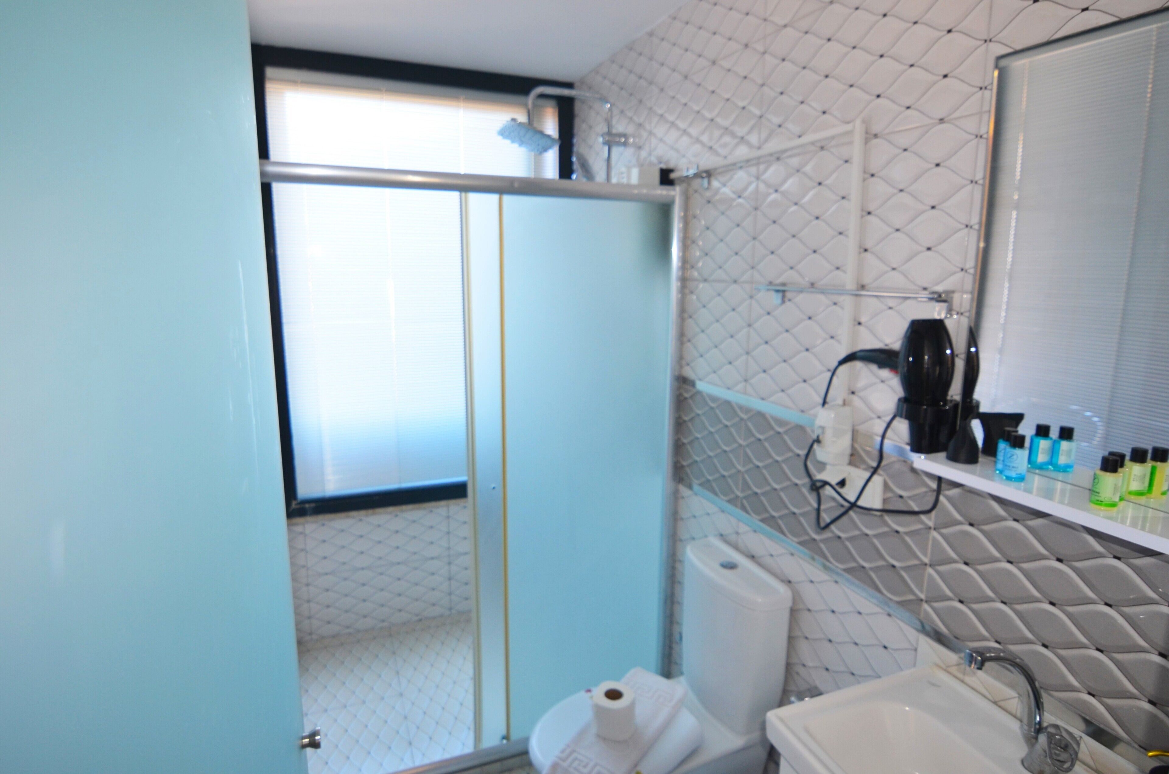 romantic studio suite, 1 bedroom, jetted tub, sea view | bathroom | shower, free toiletries, hair dryer, slippers