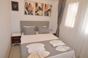 Family Apartment, 1 Bedroom | Premium bedding, Select Comfort beds, desk, laptop workspace - Mykonut Apart Hotel (Fethiye)