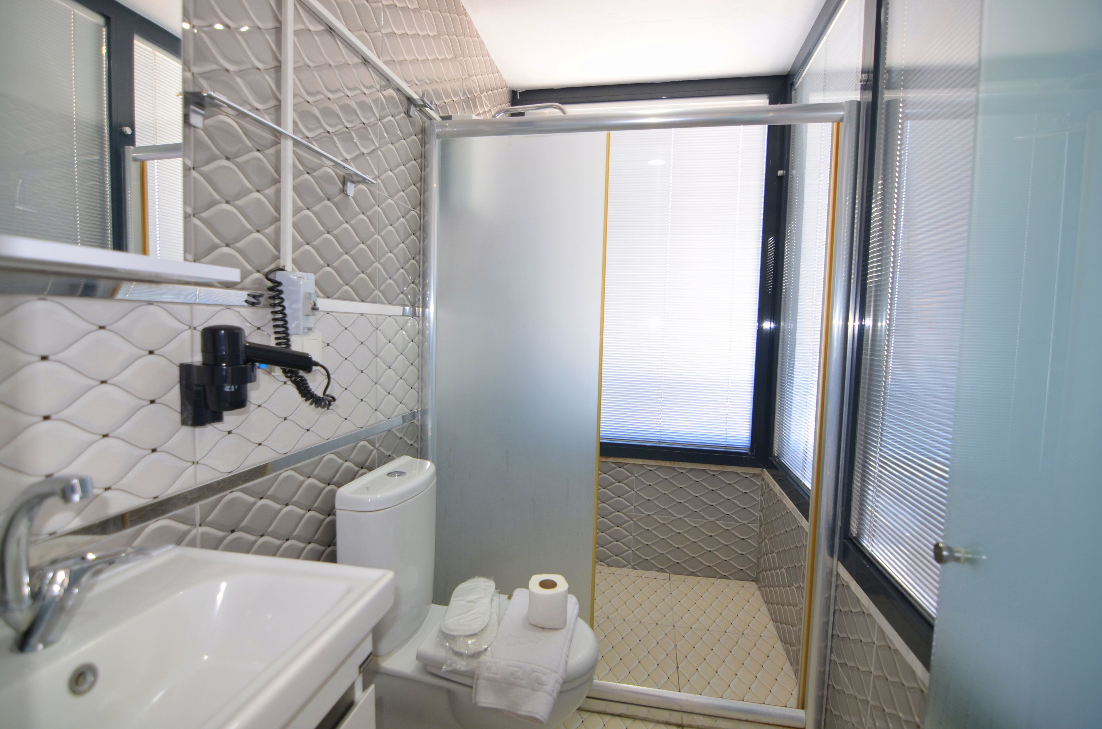 romantic double room, 1 bedroom, jetted tub, sea view | bathroom | shower, free toiletries, hair dryer, slippers