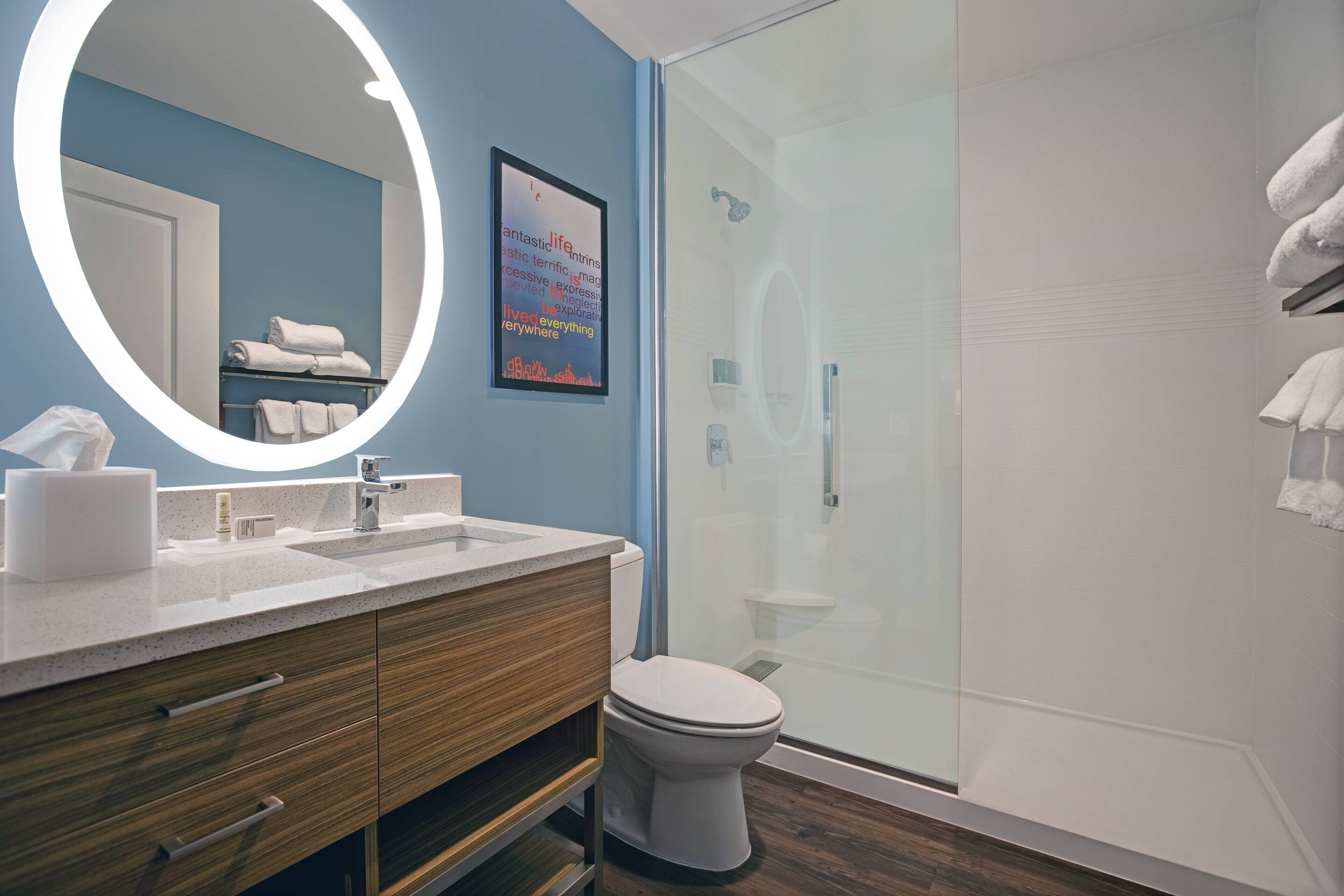 Designer toiletries, hair dryer, towels