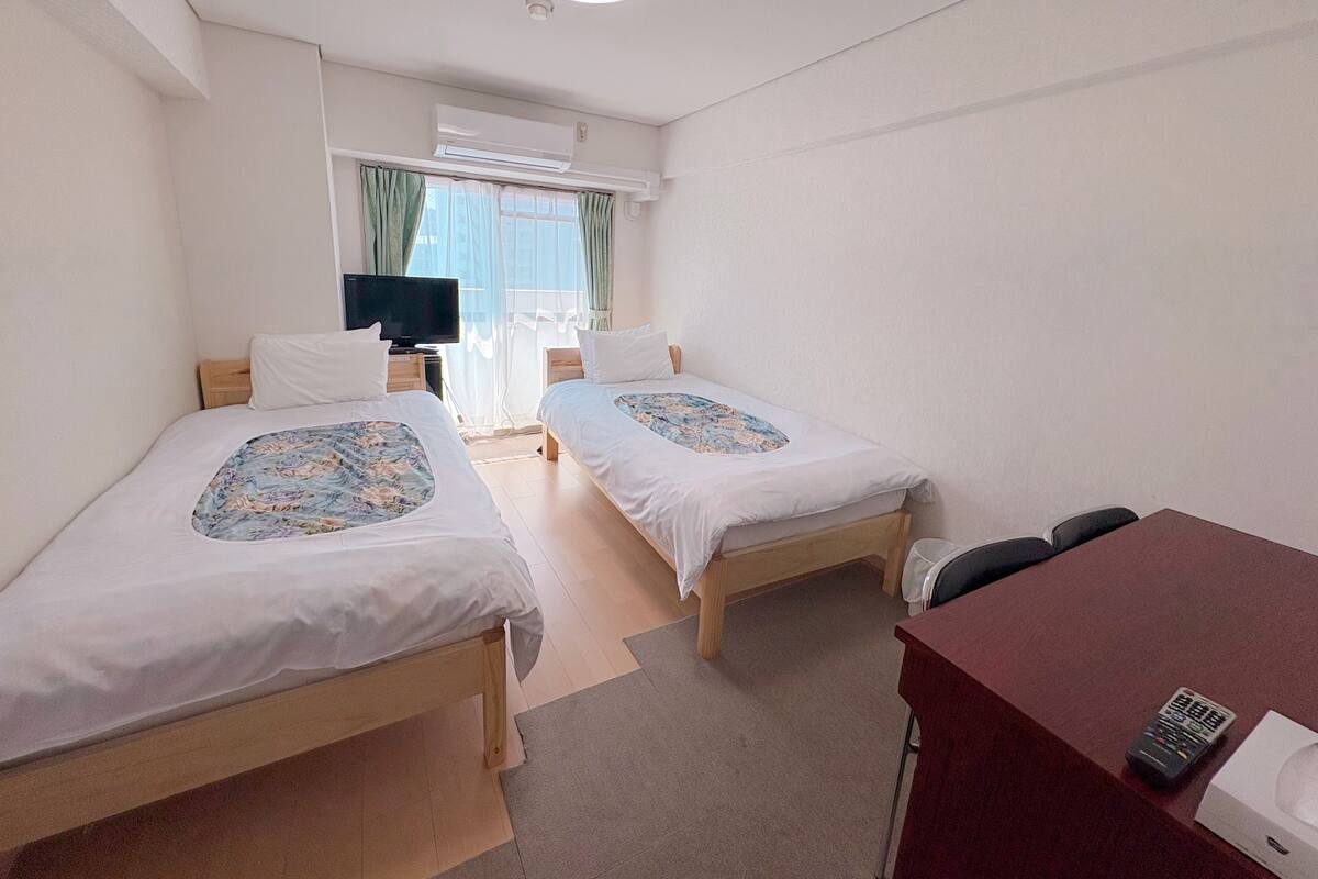 Basic Twin Room, Non Smoking | Desk, WiFi (free), bed sheets
