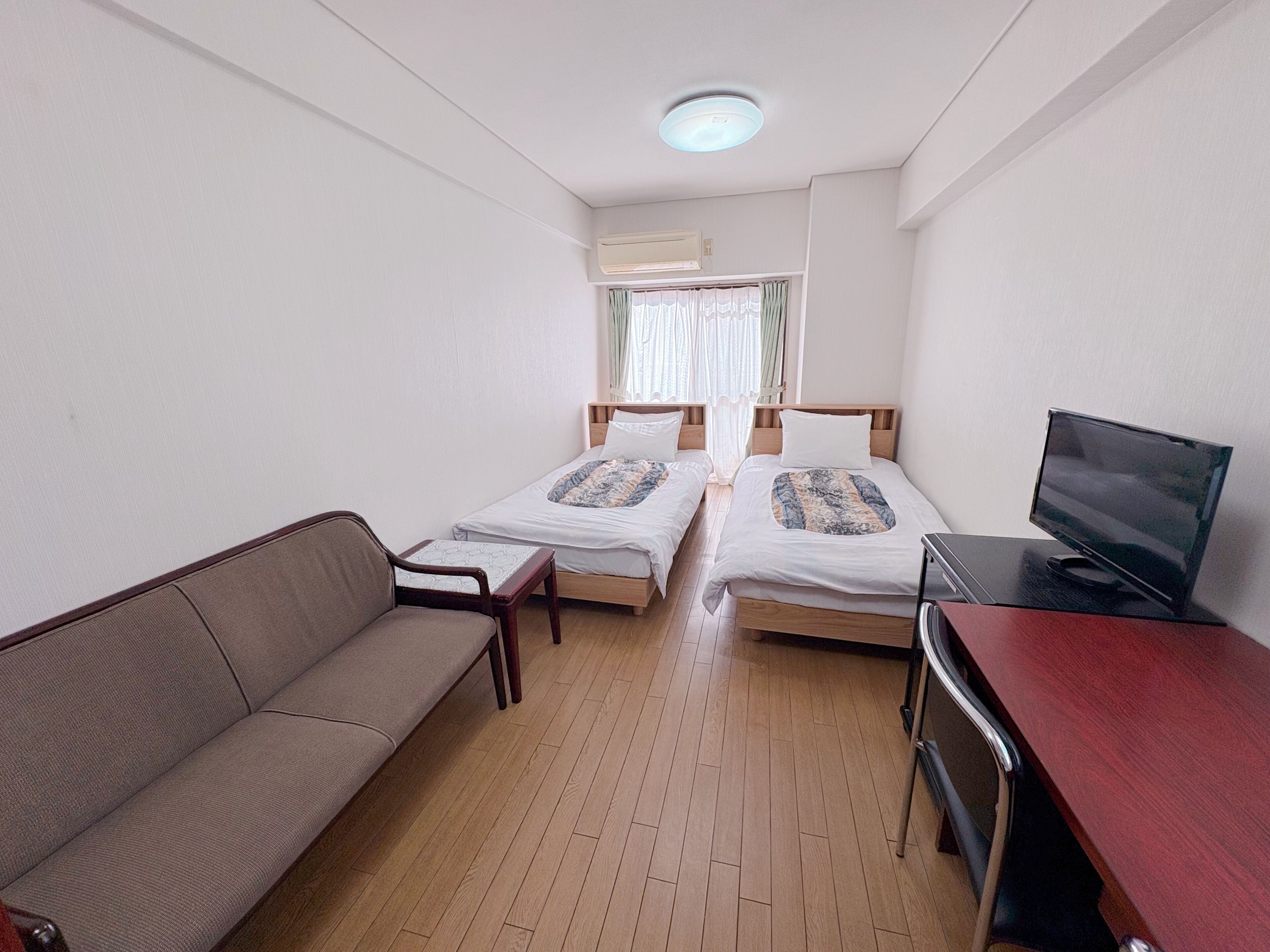 Basic Twin Room, Non Smoking (with Sofa) | Desk, free WiFi, bed sheets