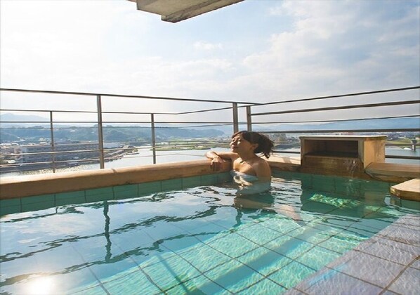 Enjoy a refreshing swim with a clear view of the surrounding landscape from our outdoor pool.