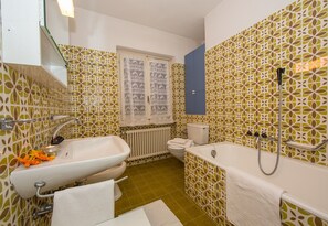 Family Apartment, Multiple Bedrooms, 2 Bathrooms (Chalet Cademario) | Bathroom | Combined shower/tub, rainfall showerhead, bidet, towels