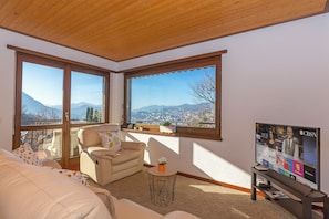 Family Apartment, Multiple Bedrooms, 2 Bathrooms, Mountainside (Chiara's Home) | Living area | 22-inch flat-screen TV with digital channels, TV, DVD player