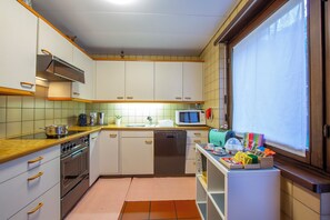 Family Apartment, Multiple Bedrooms, 2 Bathrooms, Mountainside (Chiara's Home) | Private kitchen | Full-size fridge, microwave, oven, stovetop - Chiara's Home (Lugano)