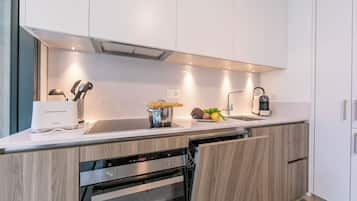 Family Apartment, Multiple Bedrooms (Fairy Home) | Private kitchen | Full-size fridge, microwave, oven, stovetop