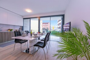 Family Apartment, Multiple Bedrooms (Magic Home) | Private kitchen | Full-size fridge, microwave, oven, stovetop