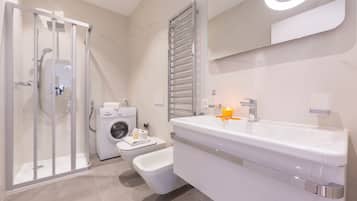 Family Apartment, Multiple Bedrooms (Heart of Lugano) | Bathroom | Shower, rainfall showerhead, free toiletries, hair dryer