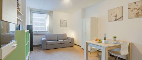 22-inch flat-screen TV with cable channels, TV