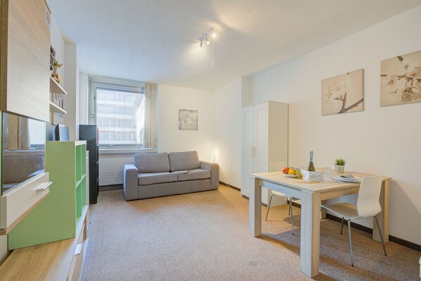 22-inch flat-screen TV with cable channels, TV