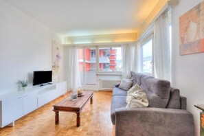 Family Apartment, Multiple Bedrooms (Kiki House) | Living area | 22-inch flat-screen TV with digital channels, TV - Kiki House (Lugano)