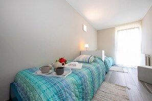 Family Apartment, Multiple Bedrooms, 2 Bathrooms (Laguna di Lugano) | 3 bedrooms, iron/ironing board, free WiFi, bed sheets - Laguna di Lugano (Lugano)