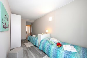 家庭公寓, 多间卧室, 双浴室 (Laguna di Lugano) | 3 多间卧室、熨斗/熨衣板、免费 WiFi、床单