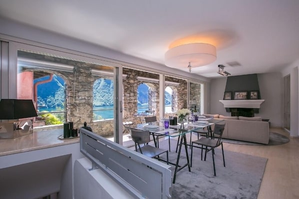 Family Apartment, Multiple Beds (Magic Gandria 2) | Living area | 32-inch flat-screen TV with satellite channels, TV, fireplace - Magic Gandria 2 (Lugano)