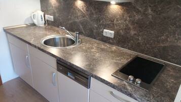 Fridge, microwave, dishwasher, coffee/tea maker