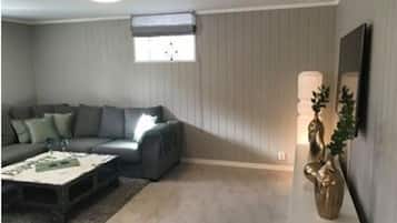 Apartment, 1 Bedroom | Living area | Flat-screen TV