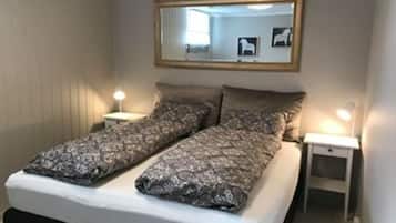 Apartment, 1 Bedroom | 1 bedroom, blackout drapes, iron/ironing board, travel crib