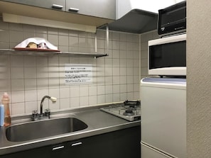 Fridge, microwave, stovetop, cookware/dishes/utensils