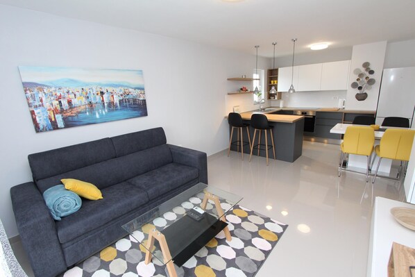 Apartment, 2 Bedrooms | Living area | Flat-screen TV