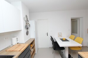 Apartment, 2 Bedrooms | Private kitchen | Fridge, oven, stovetop, dishwasher