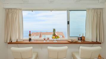 Standard Apartment, 1 Bedroom, Sea View | Living area | TV