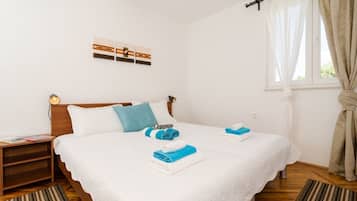 Apartemen Standar, 1 kamar tidur | 1 kamar tidur, Wi-Fi gratis, dan seprai linen