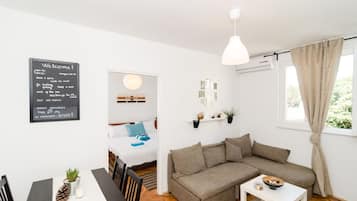 Apartemen Standar, 1 kamar tidur | Ruang keluarga | TV layar datar