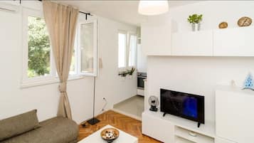 Apartemen Standar, 1 kamar tidur | Area keluarga | TV layar datar