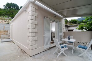 Estudio, 1 cama Queen size, patio | Terraza o patio