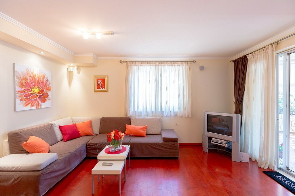 Comfort-Apartment, 1 Schlafzimmer, Terrasse | Wohnzimmer | LCD-Fernseher