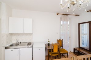 Fridge, stovetop, cookware/dishes/utensils