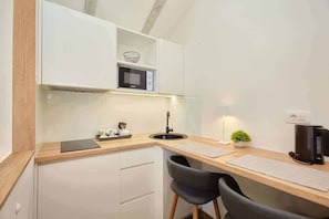 Standard Studio, Sea View | Private kitchenette | Fridge, microwave, stovetop, cookware/dishes/utensils