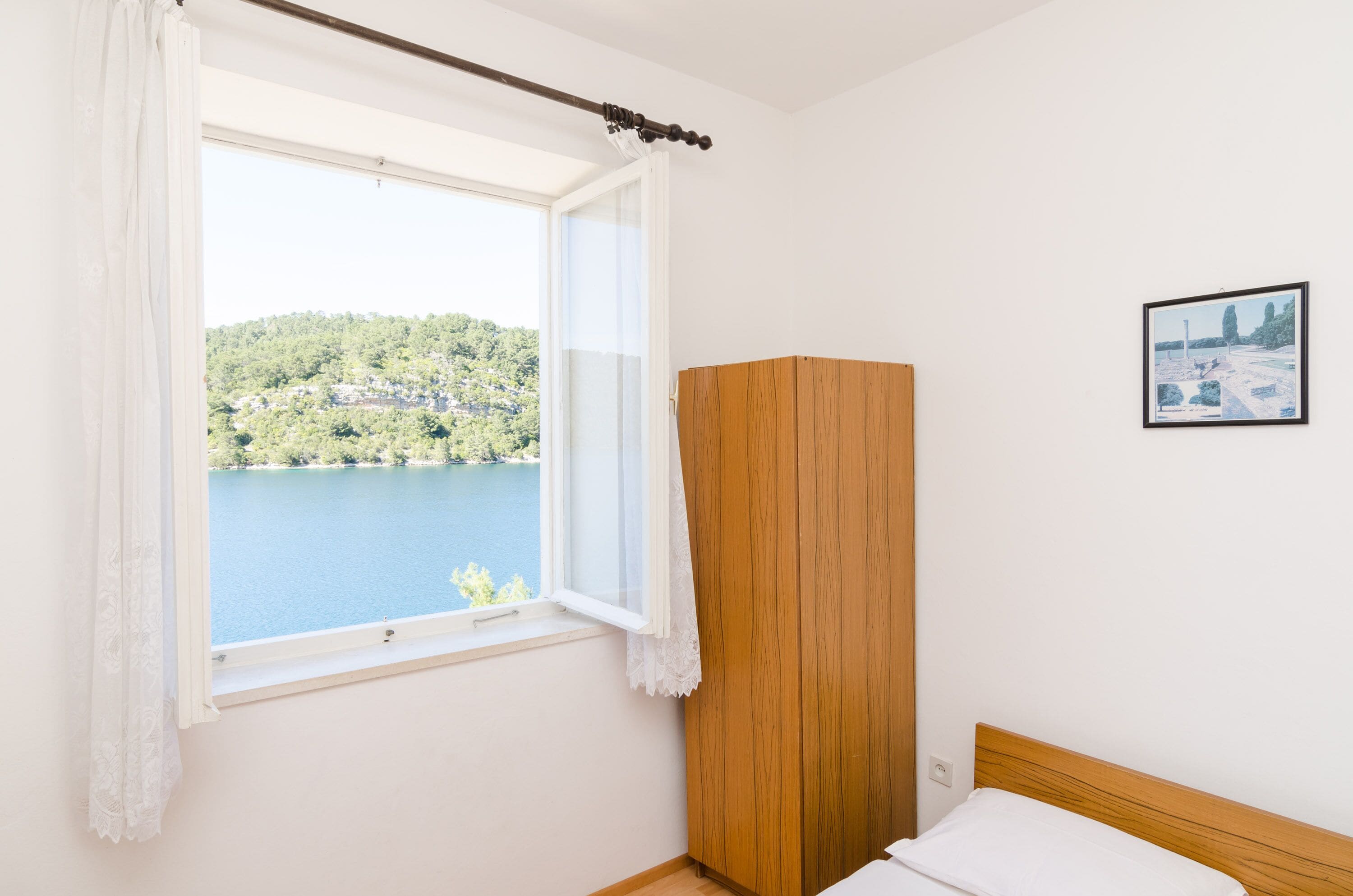 Eenvoudige kamer, 1 queensize bed, uitzicht op zee | Gratis wifi, beddengoed