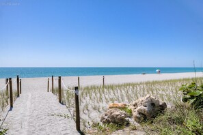 On the beach, sun loungers