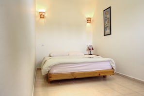 Apartamento econômico, 1 quarto (2 Guest) | 1 quarto, roupas de cama premium, Wi-Fi de cortesia, roupa de cama