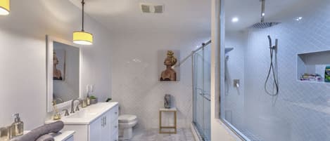 Bathtub, hair dryer, towels, soap