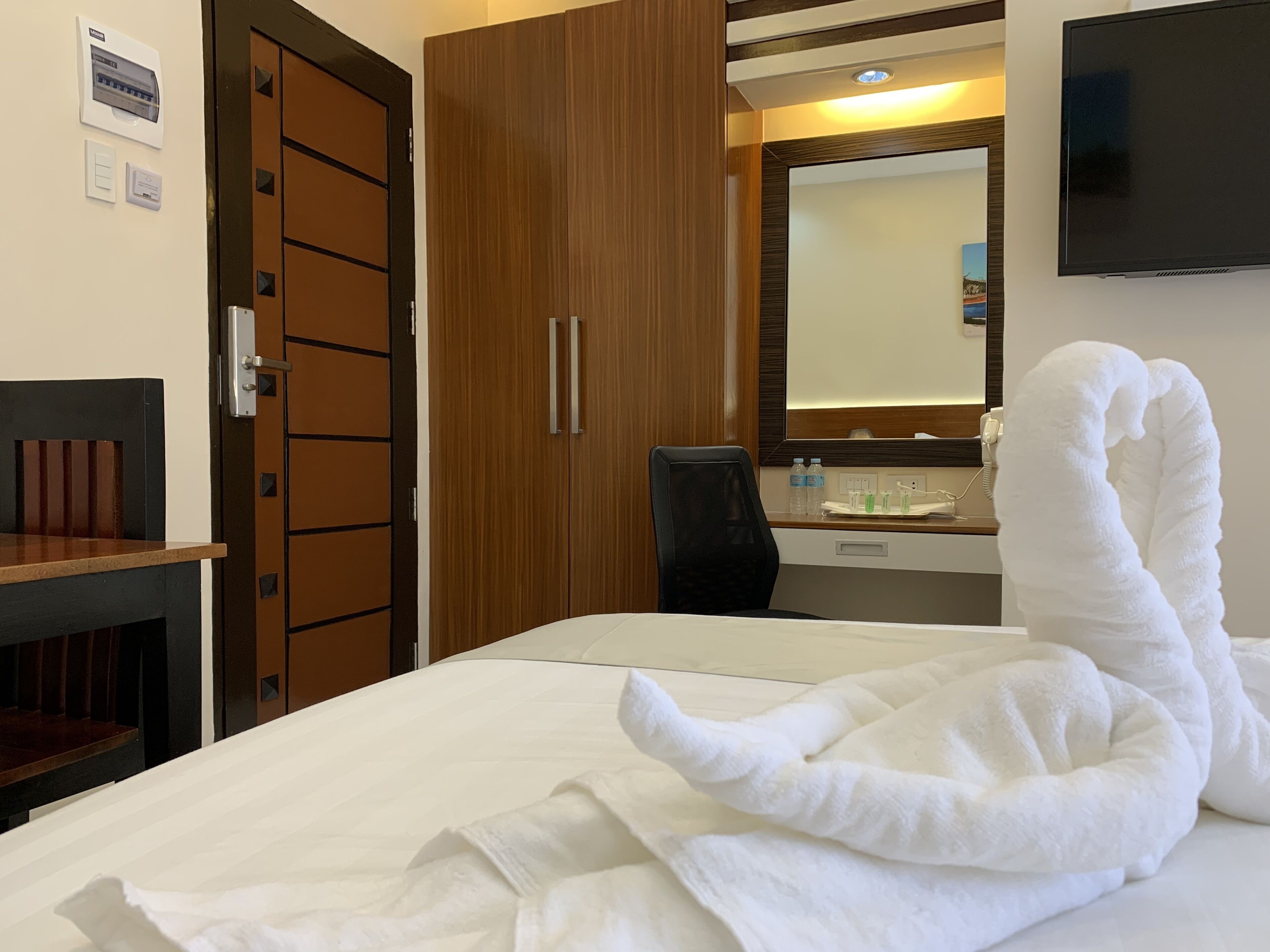Premium bedding, down comforters, pillowtop beds, in-room safe