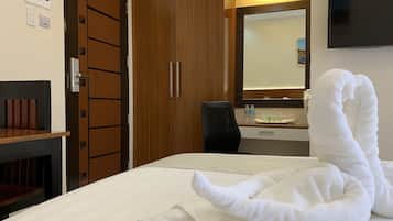 Premium bedding, down comforters, pillowtop beds, in-room safe