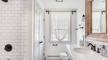 Hair dryer, towels, soap, shampoo