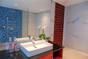 Bathtub, hair dryer, towels, soap